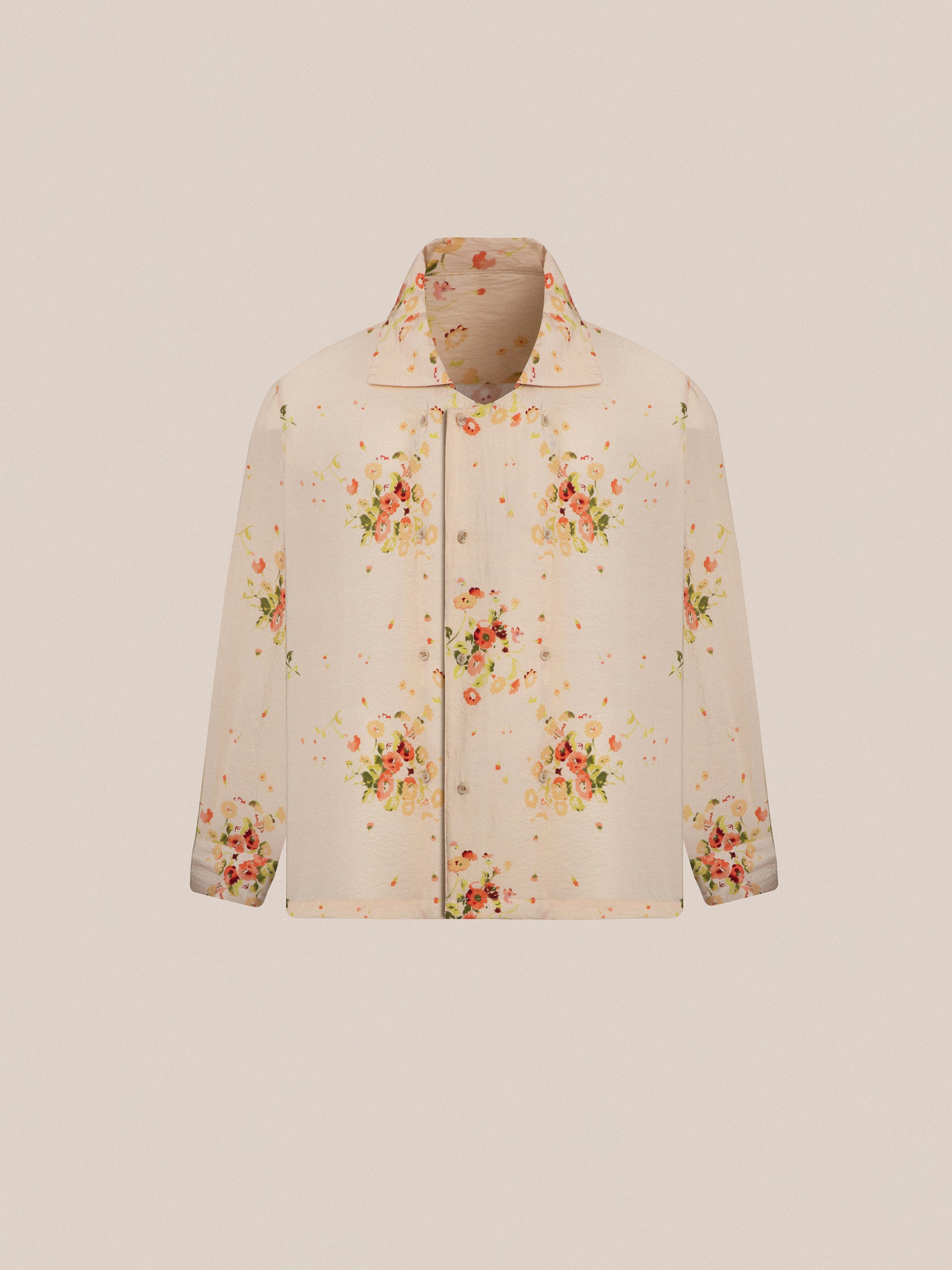 A children's Kanhati Garden Long Sleeve Camp Shirt with Phulkari motifs on it by Found.