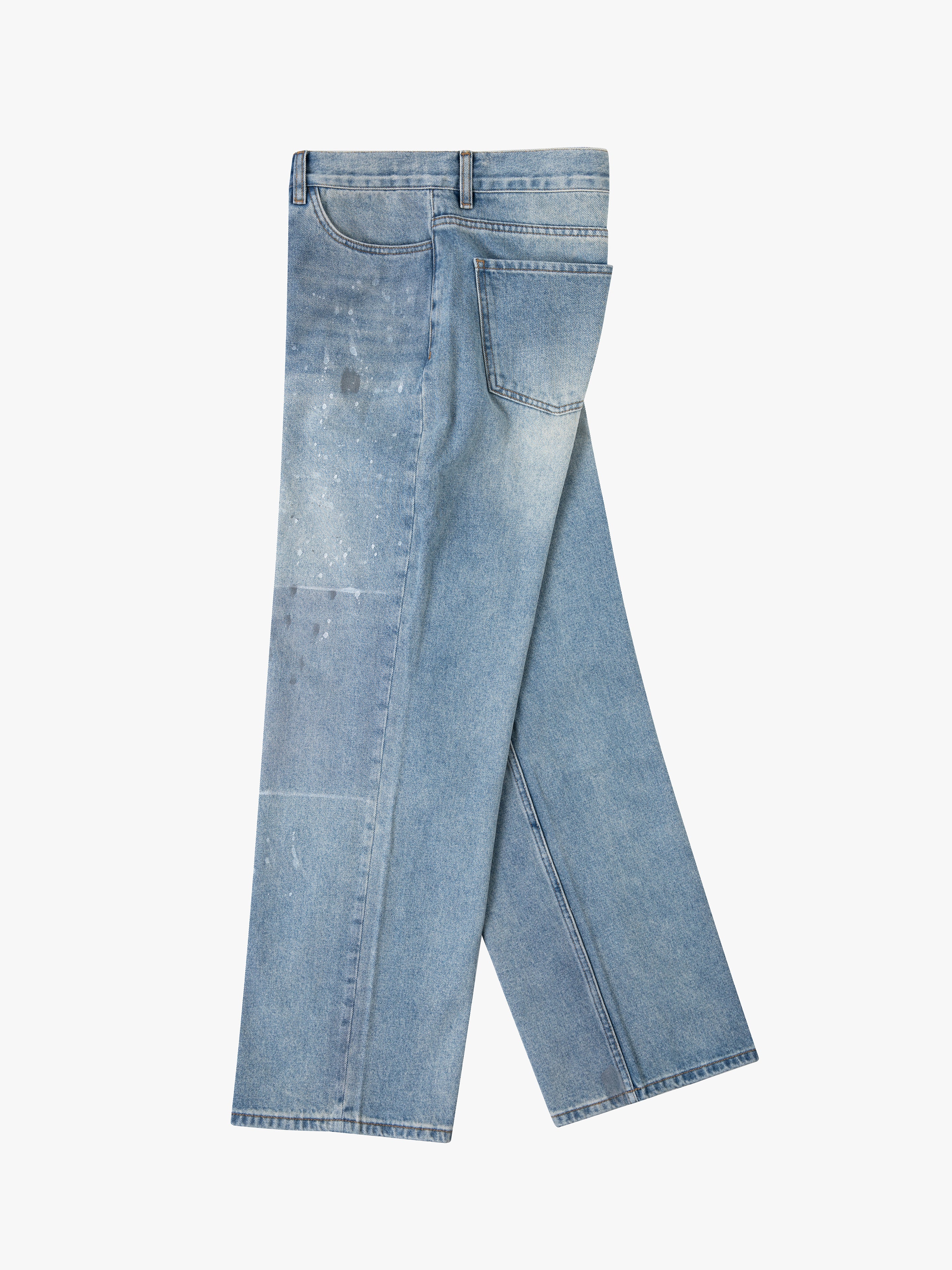 Mix Patch Jeans by Profound, featuring a light blue straight-leg denim design with subtle fading and paint splatter accents, are displayed folded against a plain background.