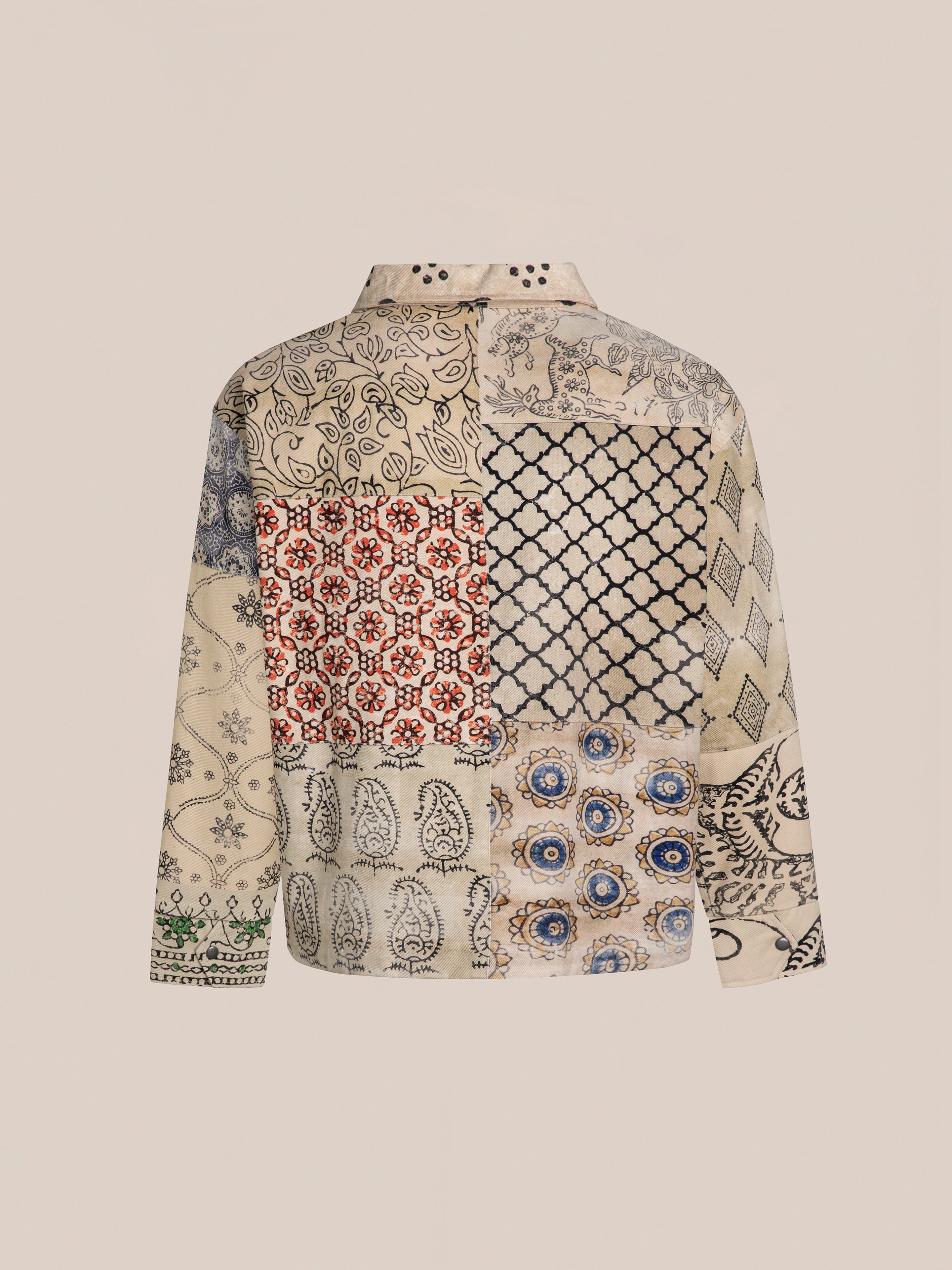 FOUND's Paisley Mosaic Work Jacket features a patchwork design with intricate paisley patterns in beige, red, blue, and black.