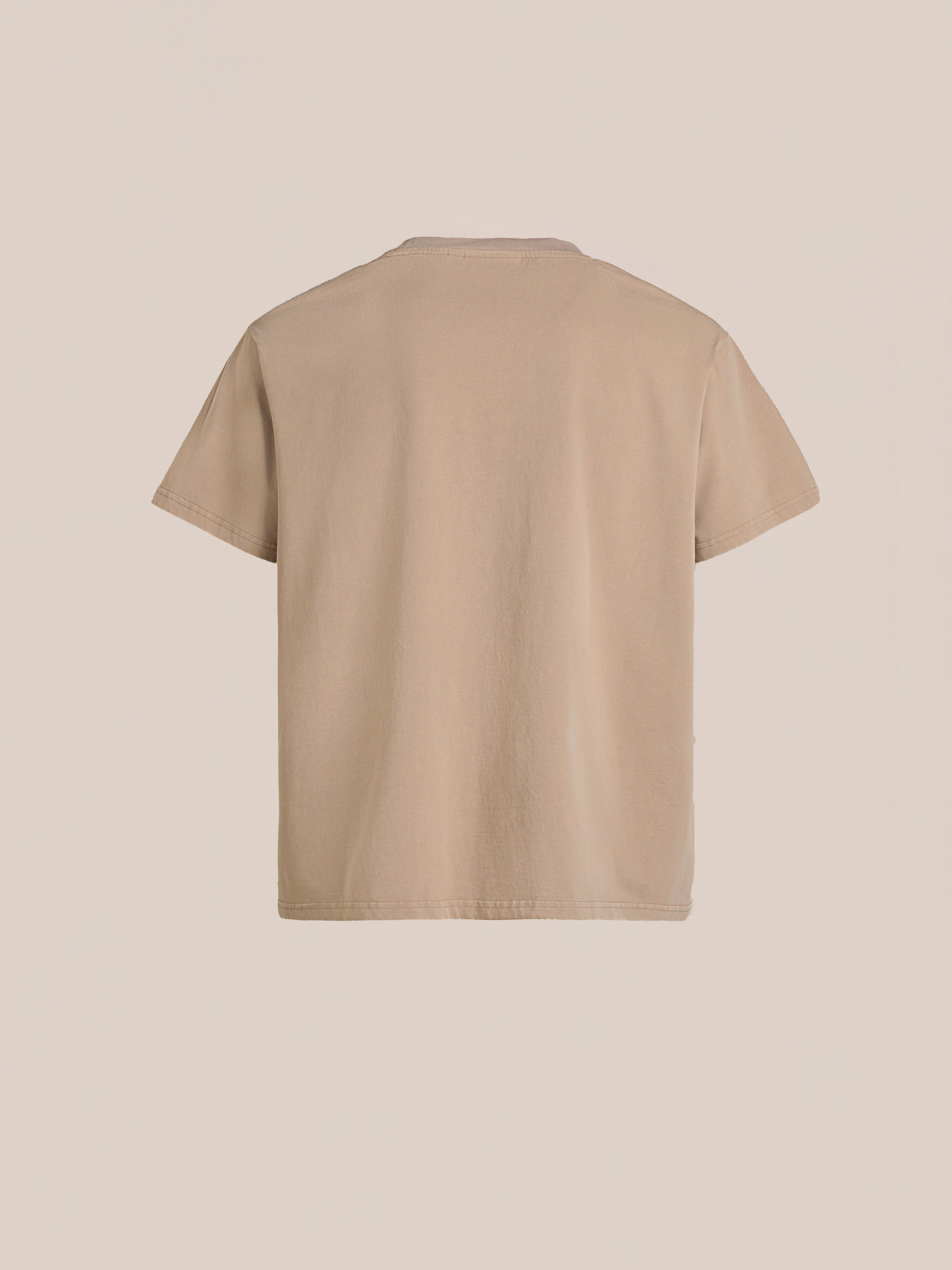 Set against a plain backdrop, the Patchwork Tee by FOUND showcases its beige back with Kantha style embroidery.