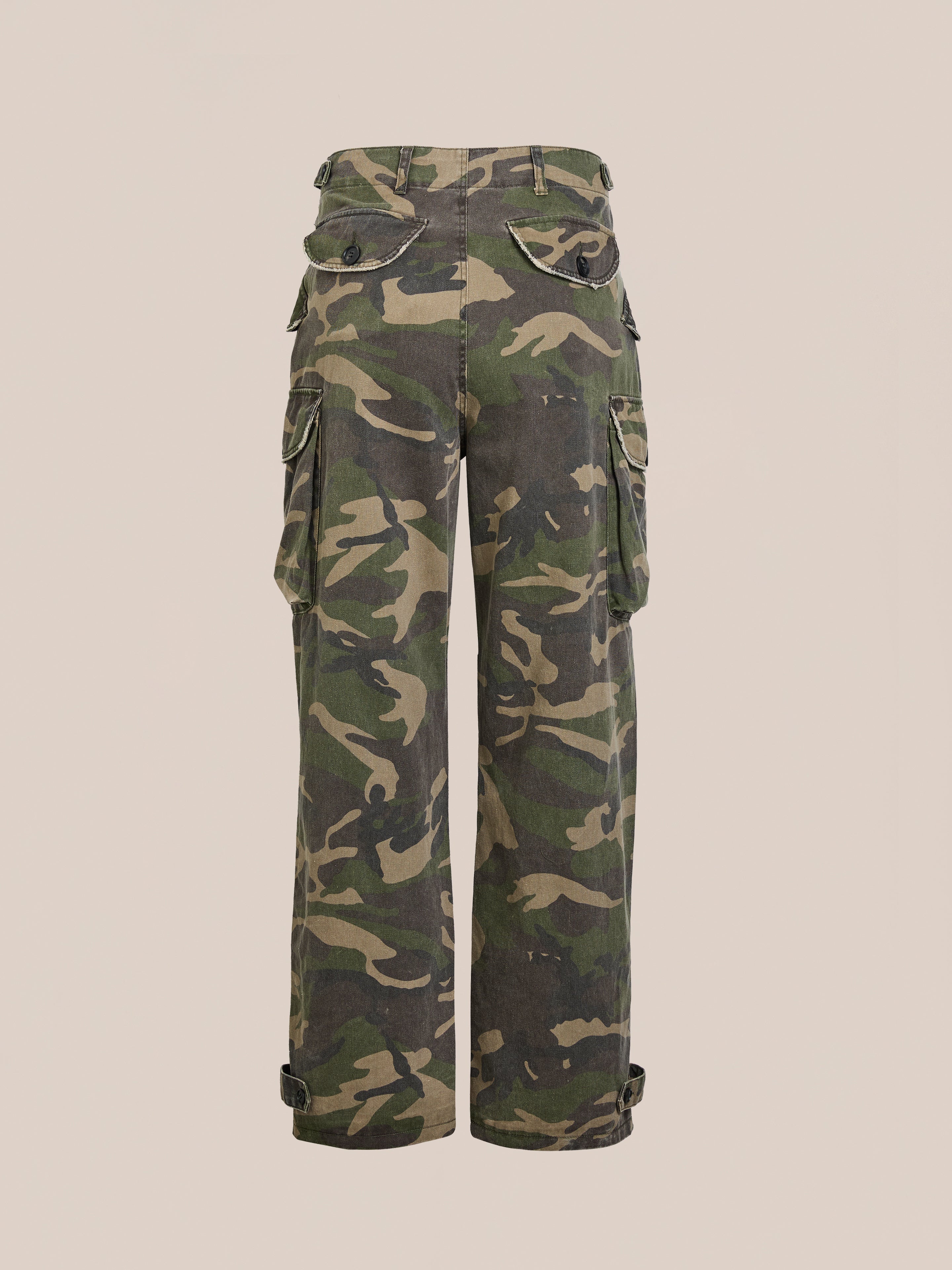 FOUND's Camouflage Twill Utility Cargo Pants feature a vintage look with a classic camo pattern and multiple pockets, set against a plain background.