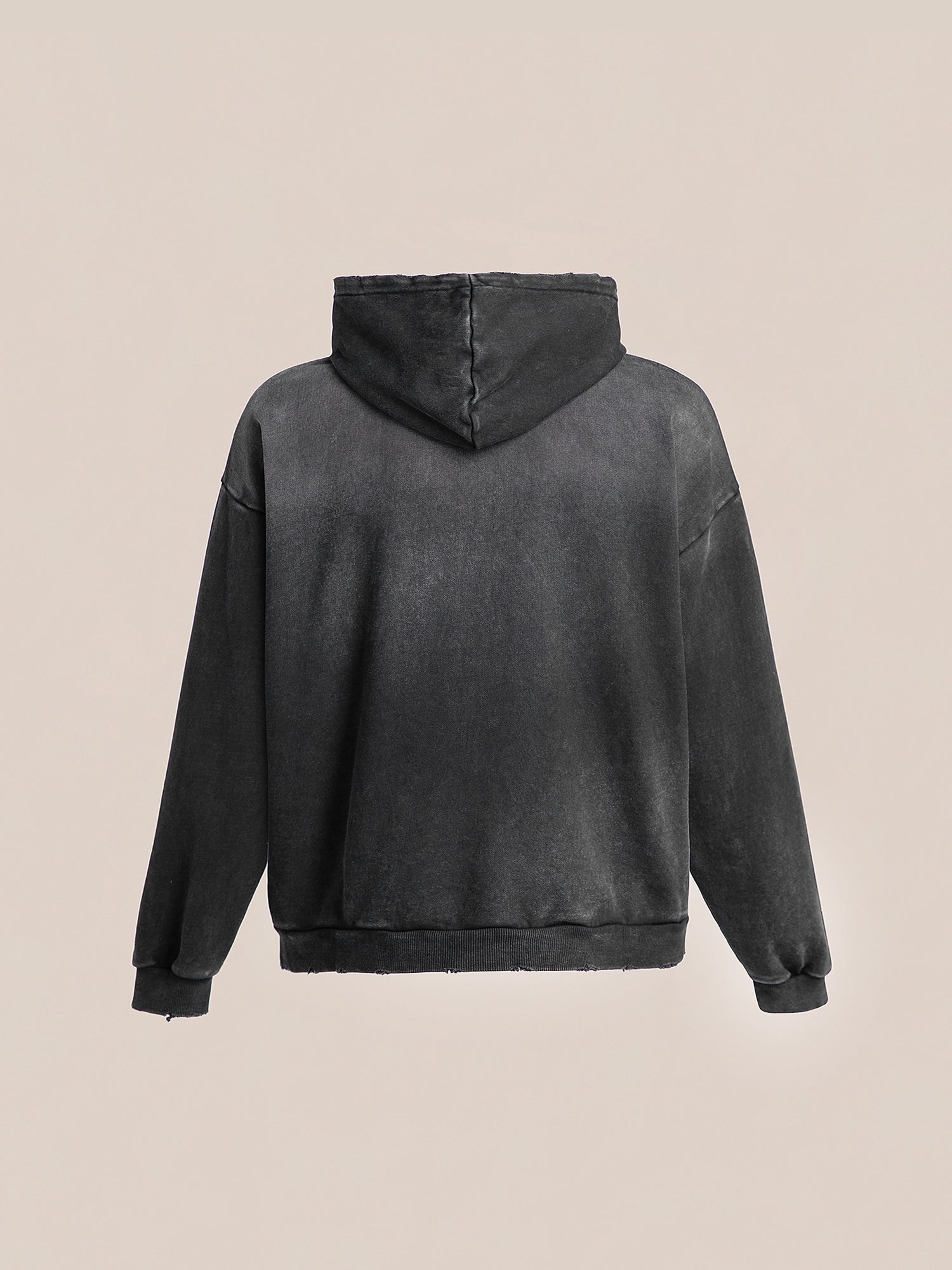 The Logo Patch Hoodie from FOUND, crafted from soft French terry cotton in a vintage black color, features a hood and long sleeves and is displayed from the back against a plain background.