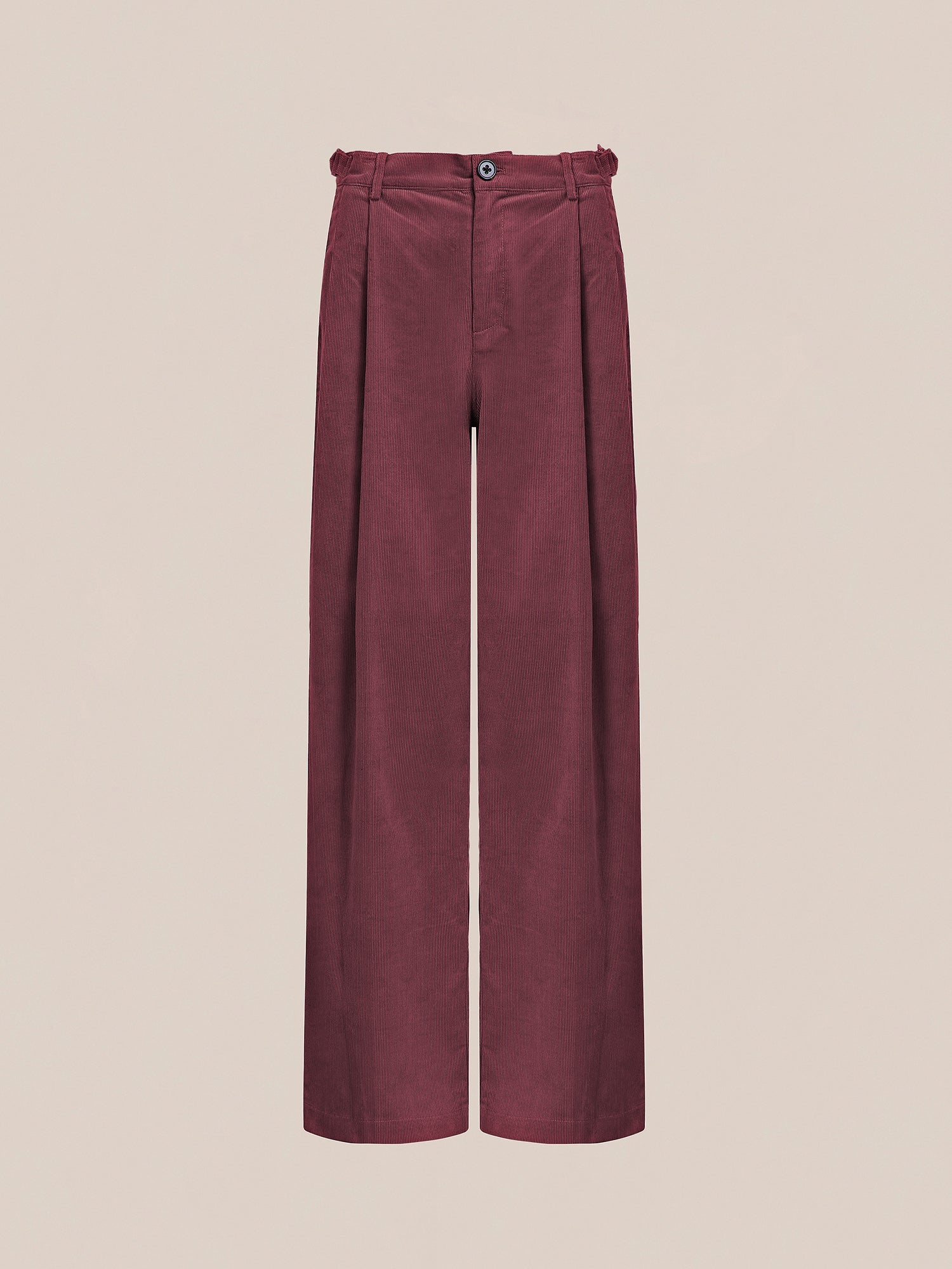 The Corduroy Pleated Trousers by FOUND are designed in red with a high-waisted, double-pleated wide-leg style, featuring a button and zip closure on a plain background.