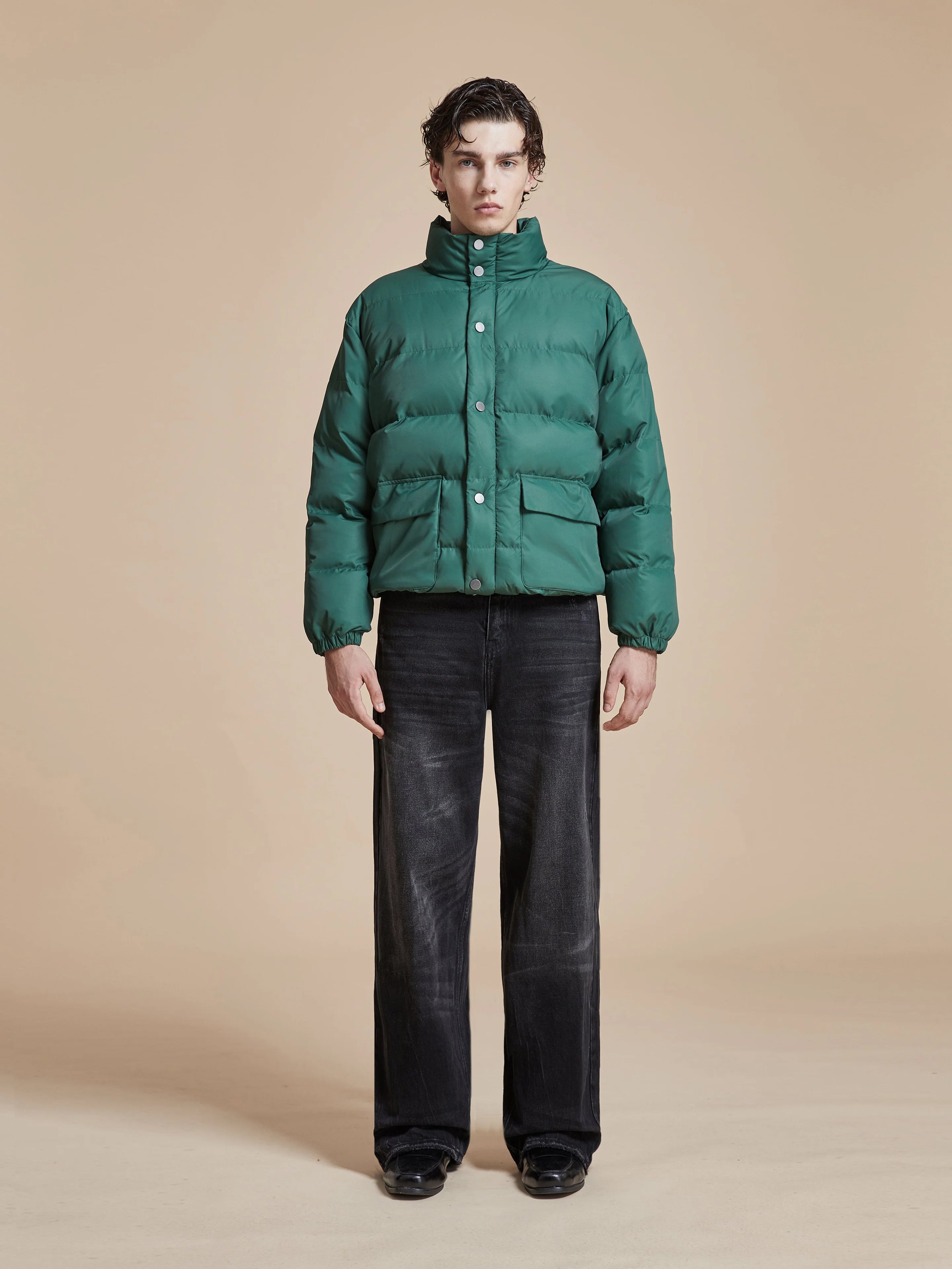 A man wearing a Laurel Pine Puffer Jacket by Found.